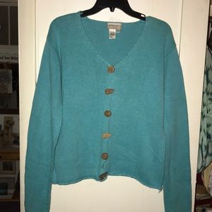 Woman’s size M turquoise button down sweater.